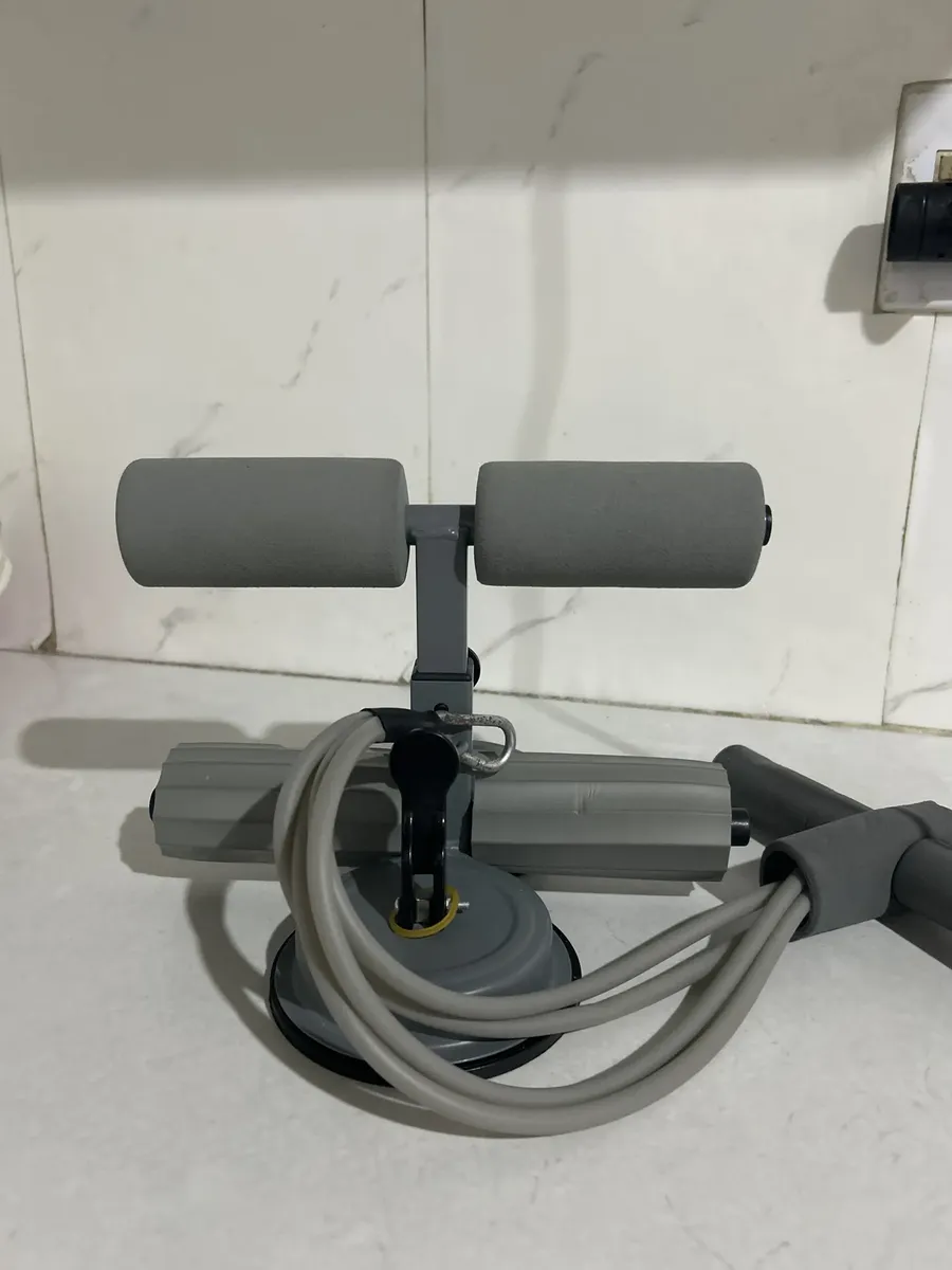 Detalhe das espumas de apoio para as pernas do aparelho